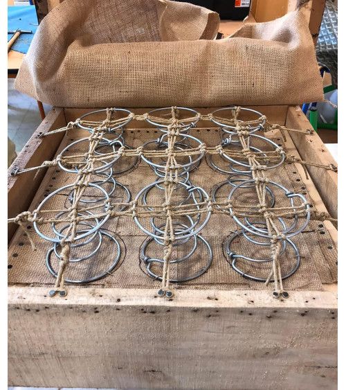 Corde de maintien des ressorts utilisée pour l’opération de guindage des fauteuils