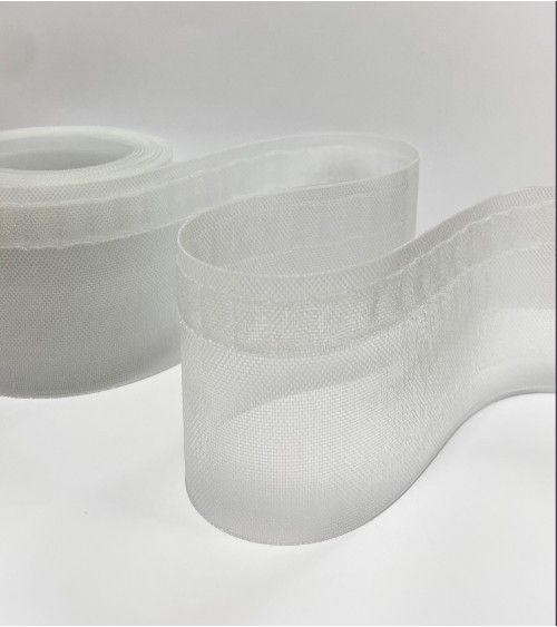 Le ruban vague transparent de 75 mm est utilisée pour créer des rideaux avec des plis réguliers et ondulés, appelés plis Wave.